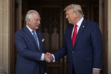 King Charles III shakes hands with US official during announcement of King Charles US visit itinerary