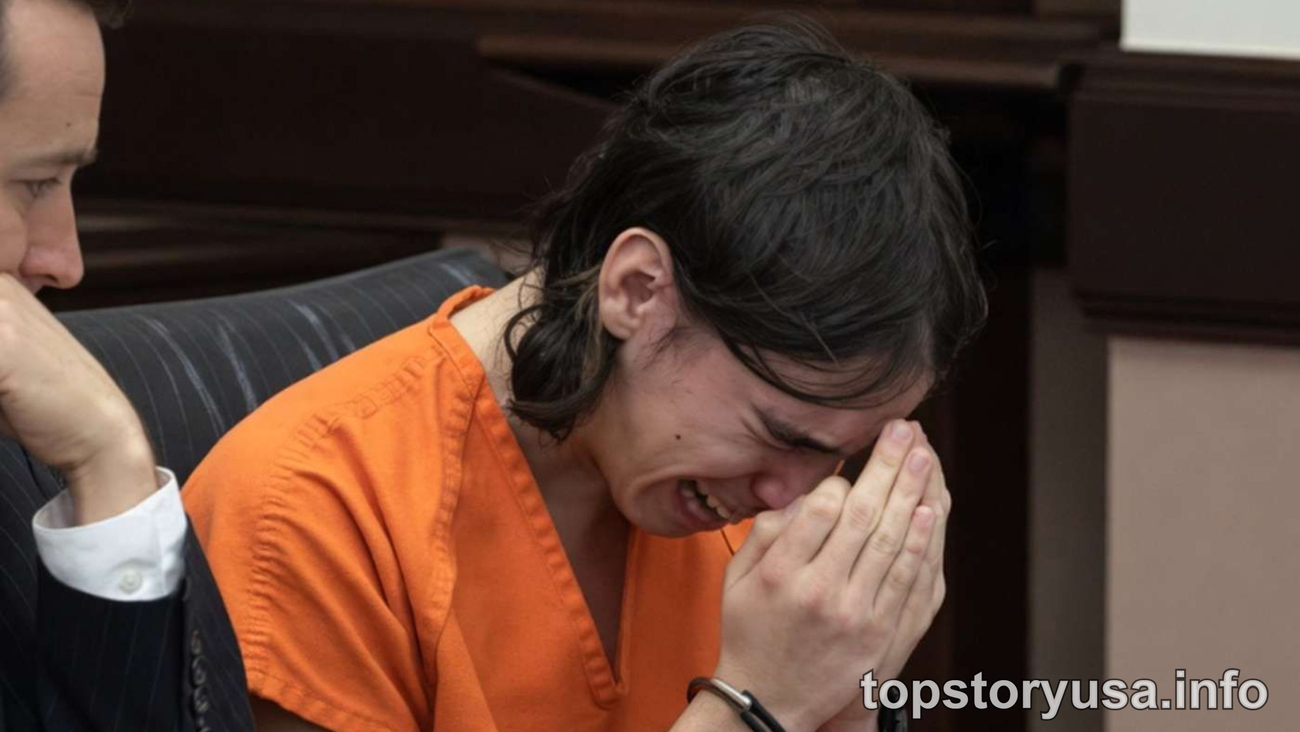 Teen defendant in orange prison clothing sitting in courtroom during sentencing hearing, highlighting teen sentencing justice debate
